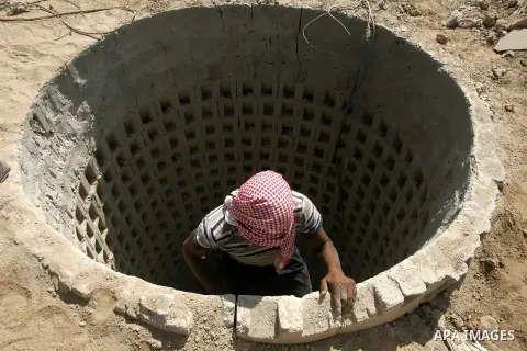 A Palestinian man ascend a tunnel along the Gaza-Egypt border in Rafah, in the southern Gaza Strip on Oct. 04, 2012. Since last month, Egyptian military have destroyed about 30 tunnels and blocked more which were used fo...