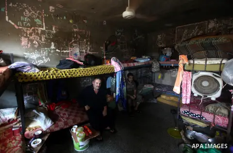 Palestinian prisoners sit in their cell in the Hamas-run Ansar prison in Gaza City on October 4, 2012. The jail holds prisoners convicted of all types of offenses. Human Rights Watch accused Gaza's ruling Hamas movement...