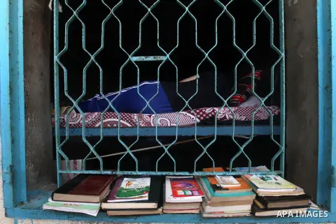 A Palestinian prisoner reads in a cell in the Hamas-run Ansar prison in Gaza City on October 4, 2012. The jail holds prisoners convicted of all types of offenses. Human Rights Watch accused Gaza's ruling Hamas movement o...