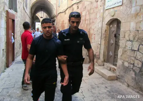 Israeli policemen stand guard during clashes with Palestinian protesters on the protesters known to Muslims as the Noble Sanctuary and to Jews as the Temple Mount in Jerusalem's Old City Oct. 04, 2012. Photo by Mahfouz A...