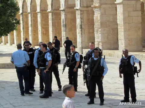 Israeli policemen stand guard during clashes with Palestinian protesters on the protesters known to Muslims as the Noble Sanctuary and to Jews as the Temple Mount in Jerusalem's Old City Oct. 04, 2012. Photo by Mahfouz A...