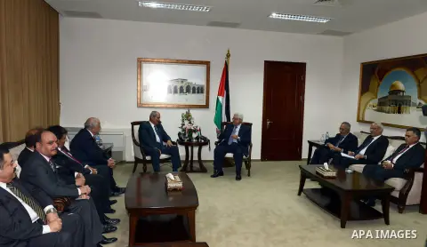 Palestinian President Mahmoud Abbas meets with Jordanian Prime Minister Fayez al-Tarawneh in the West Bank city of Ramallah, October 4, 2012. Photo by Mohamed al-Ateeq