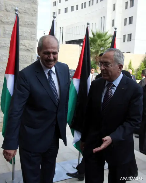 Palestinian Prime Minster Salam Fayyad, and his Jordanian counterpart Fayez al-Tarawneh at Fayyad's office in the West Bank city of Ramallah, 04 October 2012. Photo by Issam Rimawi