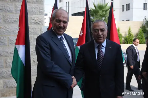 Palestinian Prime Minster Salam Fayyad, and his Jordanian counterpart Fayez al-Tarawneh at Fayyad's office in the West Bank city of Ramallah, 04 October 2012. Photo by Issam Rimawi