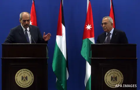 Palestinian Prime Minster Salam Fayyad, and his Jordanian counterpart Fayez al-Tarawneh during a press conference at Fayyad's office in the West Bank city of Ramallah, 04 October 2012.. Photo by Issam Rimawi