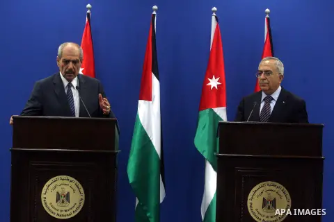 Palestinian Prime Minster Salam Fayyad, and his Jordanian counterpart Fayez al-Tarawneh during a press conference at Fayyad's office in the West Bank city of Ramallah, 04 October 2012.. Photo by Issam Rimawi