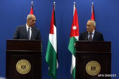 Palestinian Prime Minster Salam Fayyad, and his Jordanian counterpart Fayez al-Tarawneh during a press conference at Fayyad's office in the West Bank city of Ramallah, 04 October 2012.. Photo by Issam Rimawi