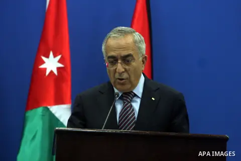 Palestinian Prime Minster Salam Fayyad, and his Jordanian counterpart Fayez al-Tarawneh (unseen) talks during a press conference at Fayyad's office in the West Bank city of Ramallah, 04 October 2012.. Photo by Issam Rima...