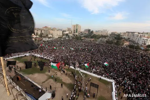 Palestinian supporters of Islamic Jihad movement take part in a ceremony marking the 25th anniversary of the movement's establishment and the 17th anniversary of the death of the group's leader Fathi Shekaki in Gaza City...