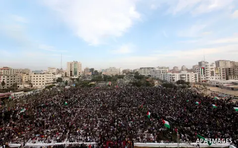 Palestinian supporters of Islamic Jihad movement take part in a ceremony marking the 25th anniversary of the movement's foundation and the 17th anniversary of the death of the group's leader Fathi Shekaki in Gaza City Oc...