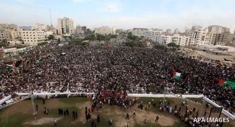 Palestinian supporters of Islamic Jihad movement take part in a ceremony marking the 25th anniversary of the movement's foundation and the 17th anniversary of the death of the group's leader Fathi Shekaki in Gaza City Oc...