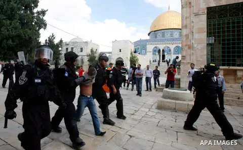 Israeli riot police detain a Palestinian worshipper during clashes at the Al Aqsa Mosque compound, known by the Jews as the Temple Mount, in Jerusalem's Old City, Friday, Oct. 5, 2012. Earlier this week, hardline Jewish...
