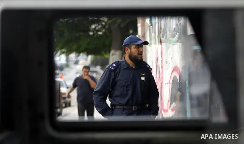 Palestinian security agencies of the Ministry of Interior Security, stand during maneuver to measure the ability of members of the security field settings in the event of any emergency, in Gaza City, on Oct. 06, 2012. Ph...