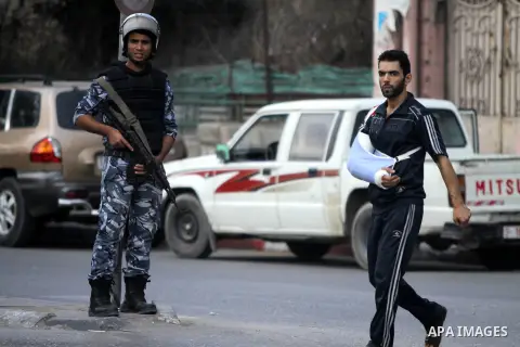 Palestinian security agencies of the Ministry of Interior Security, stand during maneuver to measure the ability of members of the security field settings in the event of any emergency, in Gaza City, on Oct. 06, 2012. Ph...
