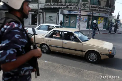Palestinian security agencies of the Ministry of Interior Security, stand during maneuver to measure the ability of members of the security field settings in the event of any emergency, in Gaza City, on Oct. 06, 2012. Ph...