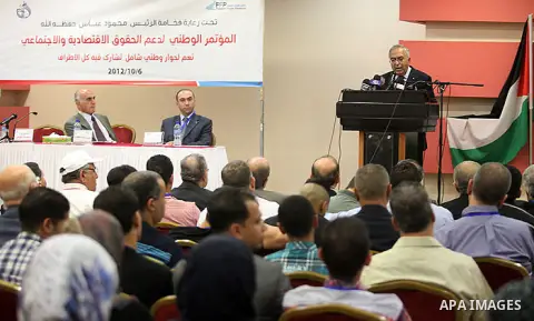 Palestinian Prime Minister Salam Fayyad speaks during the conference of support national economic and social rights, in the West Bank city of Ramallah, Oct. 06, 2012. Photo by Mustafa Abu Dayeh