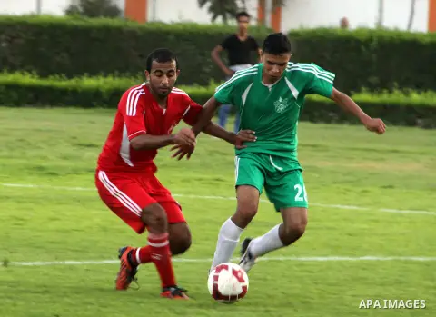 Palestinian soccer team of al-Ahly and the team of Rafah play during the 4th round in the premier league in Gaza city on Oct. 06 2012. Photo by Alaa Shamaly