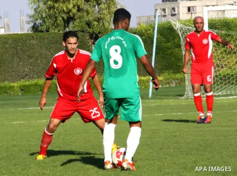 Palestinian soccer team of al-Ahly and the team of Rafah play during the 4th round in the premier league in Gaza city on Oct. 06 2012. Photo by Alaa Shamaly