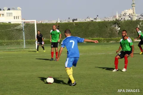 Palestinian soccer team of Shijaia and the team of Nusseirat services play during the 4th round in the premier league in Gaza city on Oct. 07 2012. Photo by Alaa Shamaly