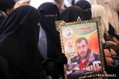 Palestinian women hold pictures of their relatives prisoners held in Israeli jails during a protest calling for their release in front of the red cross office in Gaza city October 08, 2012 . Photo by Majdi Fathi