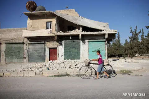 Syrians inspect damages in Mare' northen city of Aleppo after the area was shelled by Syrian regime forces on September 09 2012. Forces loyal to President Bashar al-Assad shelled rebel-held areas across Syria as fierce c...