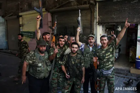 Free Syrian Army take position during clashes with regime forces in Aleppo in northern Syria on September 08, 2012. Photo by Ahmed Deeb