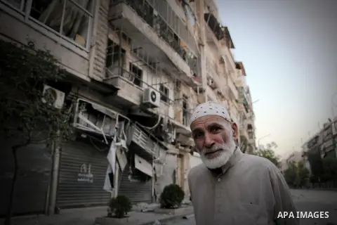 Syrians inspect damages in the old city of Aleppo after the area was shelled by Syrian regime forces on September 08 2012. Forces loyal to President Bashar al-Assad shelled rebel-held areas across Syria as fierce clashes...