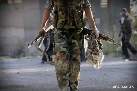 Free Syrian Army take position during heavy clashes with Syrian government forces , in the Old Town of Aleppo, September 07, 2012, to retake control of the large Hanano army base in Aleppo. Photo by Ahmed Deeb