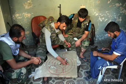 Free Syrian Army take position during clashes with regime forces in Bab al-Hadeed neighborhood in Aleppo in northern Syria on September 21, 2012. Photo by Ahmed Deeb