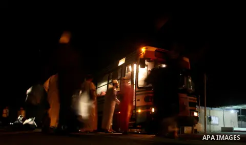 Palestinian pilgrims sit in buses as they wait to cross the Rafah border crossing into Egypt , in the southern Gaza Strip town of Rafah on Oct. 09, 2012 . Hundreds of Palestinian pilgrims crossed into Egypt on their way...