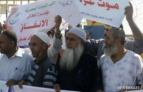 Palestinians participate a protest against Israeli siege imposed on Gaza strip during a rally in Rafah in the southern Gaza Strip, on Oct. 10, 2012. Photo by Eyad Al Baba
