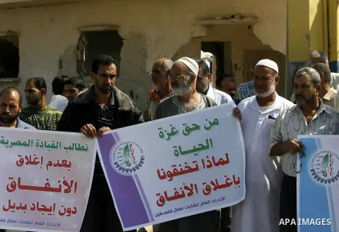 Palestinians participate a protest against Israeli siege imposed on Gaza strip during a rally in Rafah in the southern Gaza Strip, on Oct. 10, 2012. Photo by Eyad Al Baba