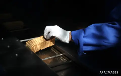 Palestinian workers quality control biscuits at the al-Awda factory in Deir al-Balah, in the central Gaza strip, on October 10, 2012. The World Food Program (WFP) will export the biscuits to United Nation run schools in...