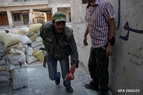 Free Syrian Army from during heavy clashes with Syrian government forces, in the Old Town of Aleppo, September 17, 2012. Photo by Ahmed Deeb