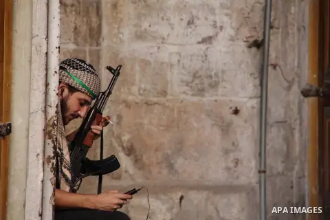 Free Syrian Army take position during clashes with regime forces in Aleppo in northern Syria on September 20, 2012. Photo by Ahmed Deeb