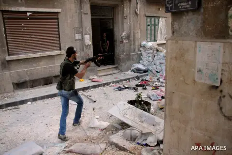 Free Syrian Army take position during clashes with regime forces in Bab al-Hadeed neighborhood in Aleppo in northern Syria on September 21, 2012. Photo by Ahmed Deeb