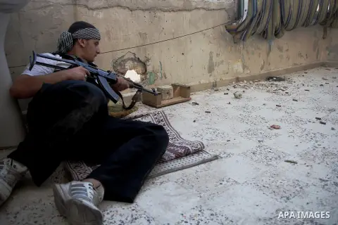 Free Syrian Army take position during clashes with regime forces in Bab al-Hadeed neighborhood in Aleppo in northern Syria on September 21, 2012. Photo by Ahmed Deeb