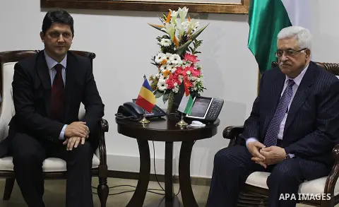 Palestinian President Mahmoud Abbas (R) meets with Romanian Foreign Minister Titus Corlatean (L) in the West Bank city of Ramallah, Oct. 10, 2011. Corlatean is on an official visit to the region. Photo by Issam Rimawi