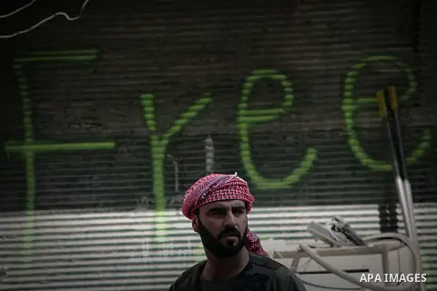 Free Syrian Army take position during clashes with regime forces in Bab al-Hadeed neighborhood in Aleppo in northern Syria on September 21, 2012. Photo by Ahmed Deeb