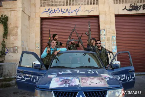 Free Syrian Army take position during clashes with regime forces in Bab al-Hadeed neighborhood in Aleppo in northern Syria on September 21, 2012. Photo by Ahmed Deeb