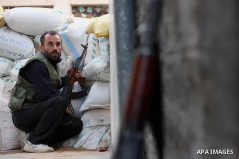 Free Syrian Army take position during clashes with regime forces in Bab al-Hadeed neighborhood in Aleppo in northern Syria on September 21, 2012. Photo by Ahmed Deeb