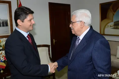 Palestinian President Mahmoud Abbas meets with Romanian Foreign Minister Titus Corlatean, in the West Bank city of Ramallah, Oct. 10, 2011. Corlatean is on an official visit to the region. Photo by Thaer Ganaim