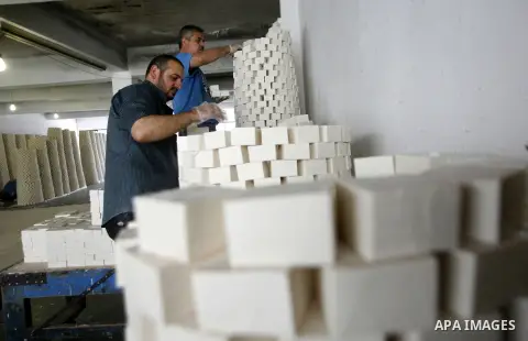 A Palestinian worker lines up soap pieces at the Touqan factory in the West Bank city of Nablus, on Oct. 11, 2012. The Touqan factory is one of the oldest manual factories in Nablus that manufactures the natural ''Nabuls...