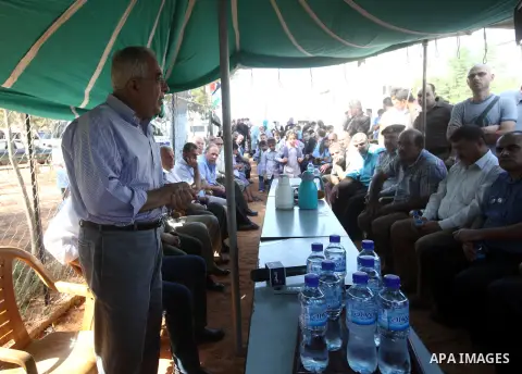 Palestinian Prime Minister Salam Fayyad visits the village of Ezbet al-Tabib in the West Bank city of Qalqilya,11 October 2012. Photo by Mustafa Abu Dayeh