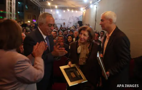 Palestinian Prime Minister visits the Palestine Book Fair Exhibition during the lunch of the exhibition, in the West Bank city of Ramallah , Oct. 11, 2012. The Palestine 8th Book Fair has participated with more than 200...