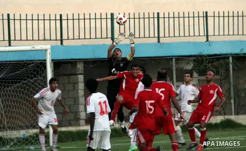 Palestinian soccer team of Gaza and the team of Palestine al-Ahli, play during the 5th round in the premier league in Gaza city on Oct. 12, 2012. Photo by Alaa Shamaly