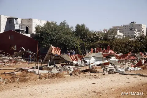 Palestinians inspect the damaged house that were built without a permit after it was demolished by an Israeli bulldozer, in the neighbourhood of Beit Hanina, in east Jerusalem, on Oct. 14, 2012. Israel regularly demolish...