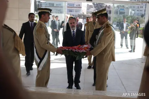 Brazilian foreign Minister Antonio Patriota lays a wreath to the tomb of former Palestinian President and PLO-leader Yassir Arafat during a visit to the West Bank city of Ramallah, October 15, 2012. Photo by Issam Rimawi