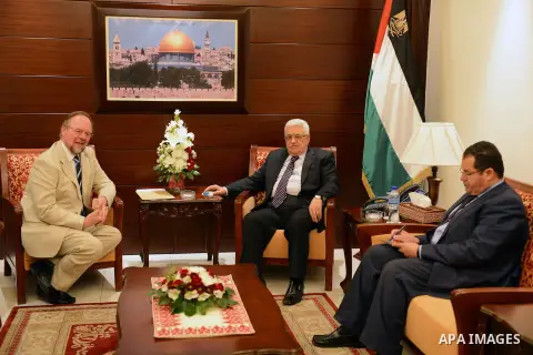 Palestinian President Mahmoud Abbas meets with the British consul, in the West Bank city of Ramallah on October 15, 2012. Photo by Thaer Ganaim