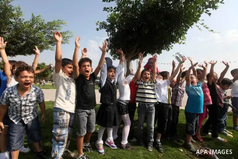 Palestinian children enjoy playing at the Al-Bashir amusement park on the outskirts of Gaza City on Oct. 18, 2012. Photo by Majdi Fathi